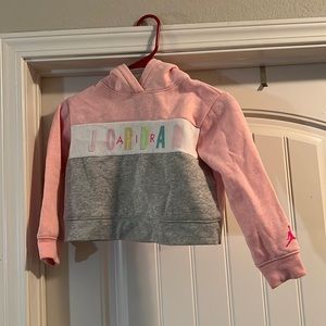 Pink and white kids Jordan pullover